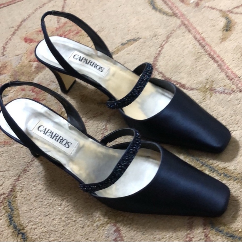 Vintage Caparros sling back heels. Bluesilky material and beaded detail.10